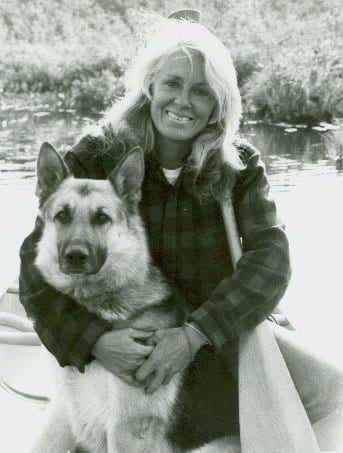 photograph of Anne LaBastille and her dog condor