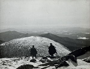 John S. Apperson Jr. and Dr. Irving Langmuir looking out over the Adirondack Mountains from the summit of Mount Marcy, NY in 1912