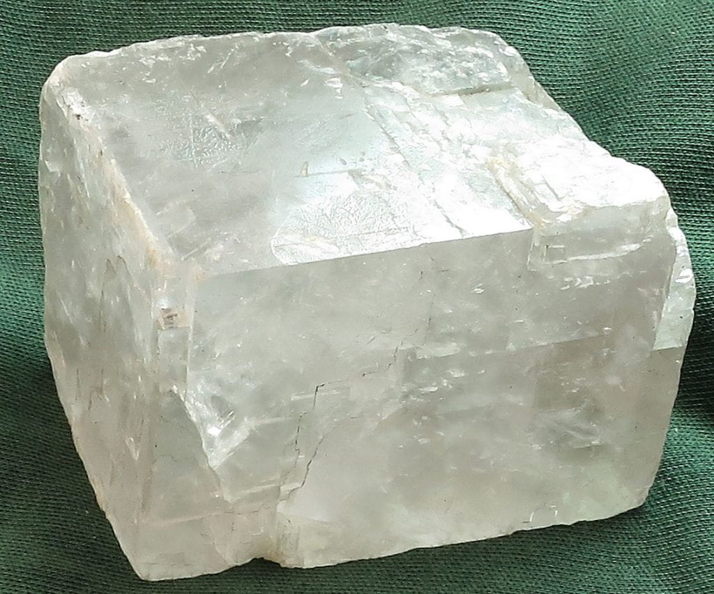 Halite with three cleavages intersecting at 90 degrees