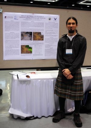 Danny Barringer ‘11 with his AAS Poster